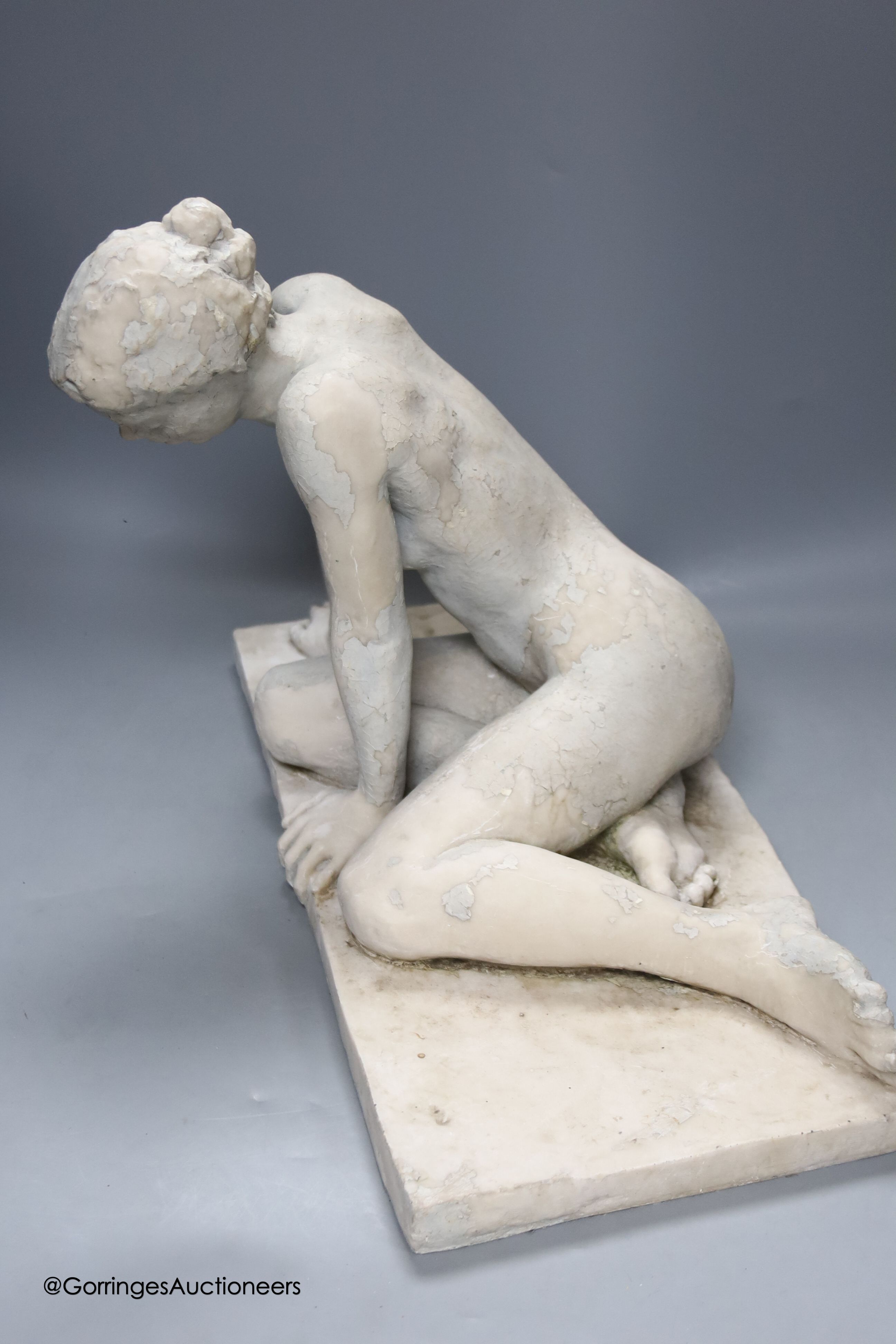 A composite figure of a seated nude, width 44cm height 32cm